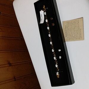 Garnet and Opal bracelet with 2 pairs earrings.